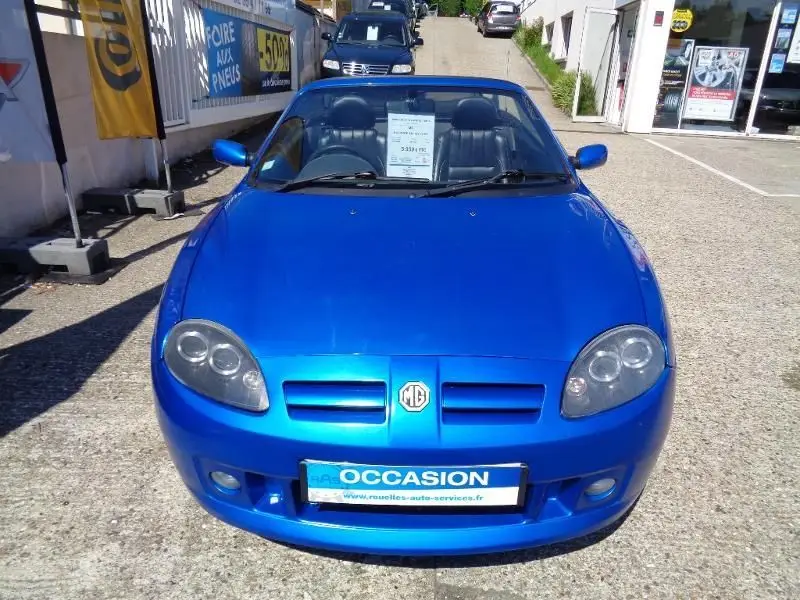 MG    TF